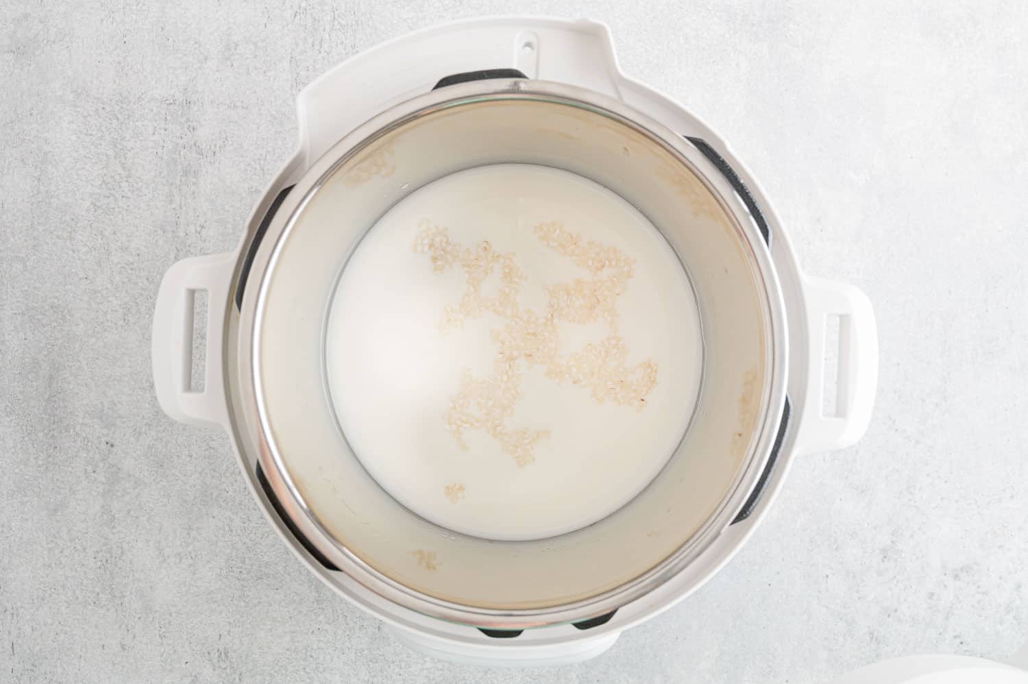 Uncooked rice pudding in an instant pot.