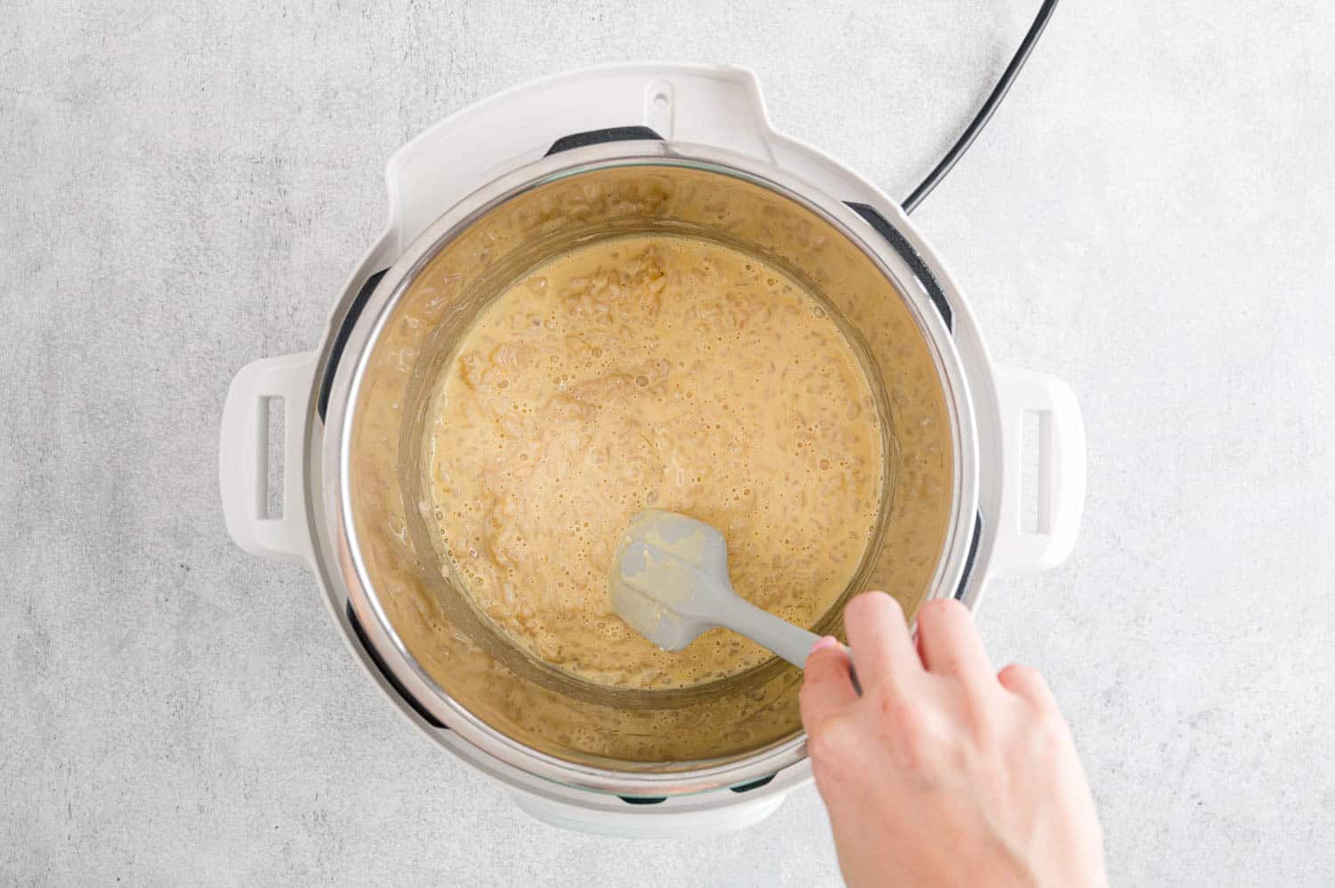 Rice pudding thickening in pressure cooker.