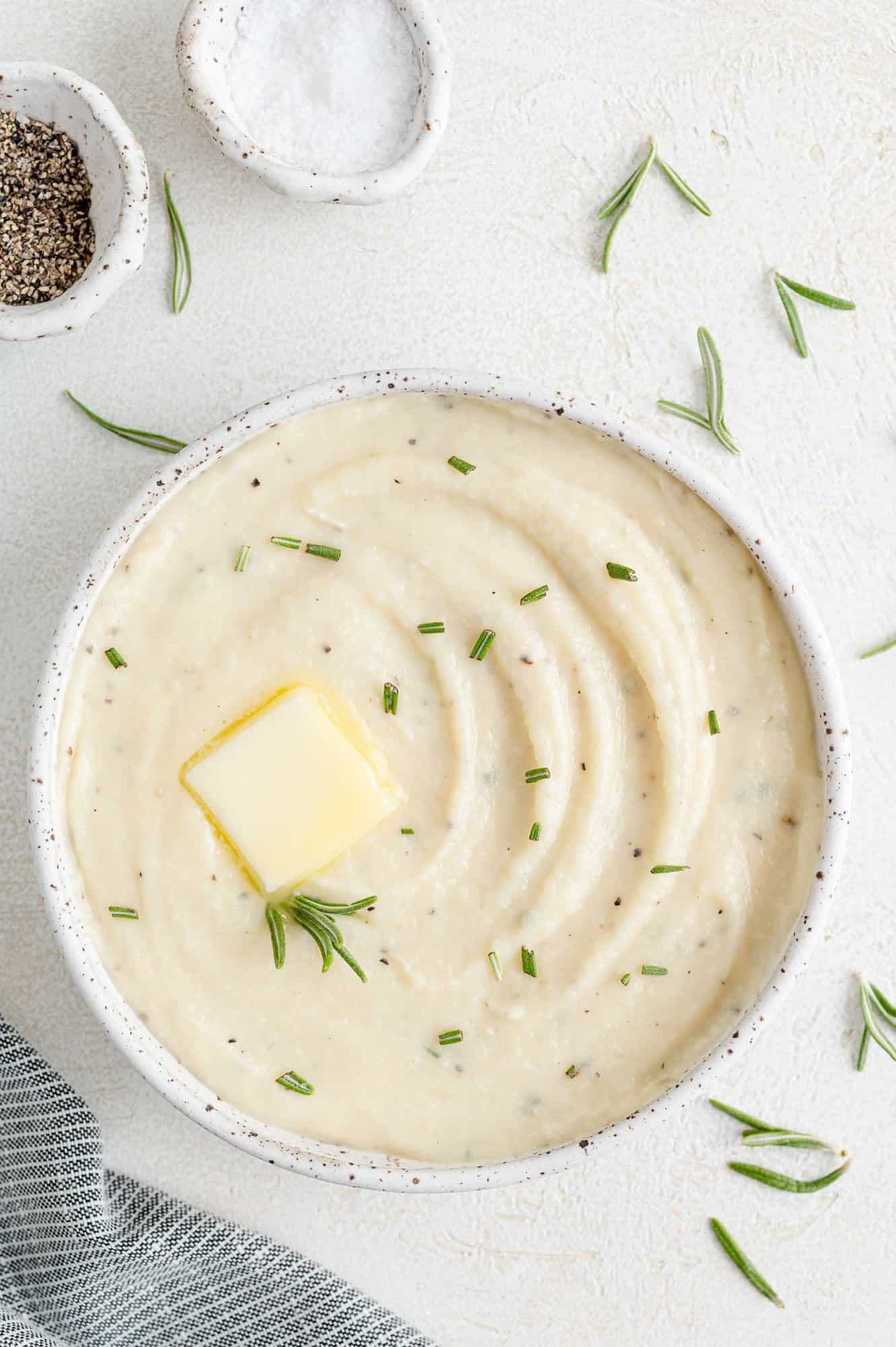 Creamy parsnip puree in a white bowl.