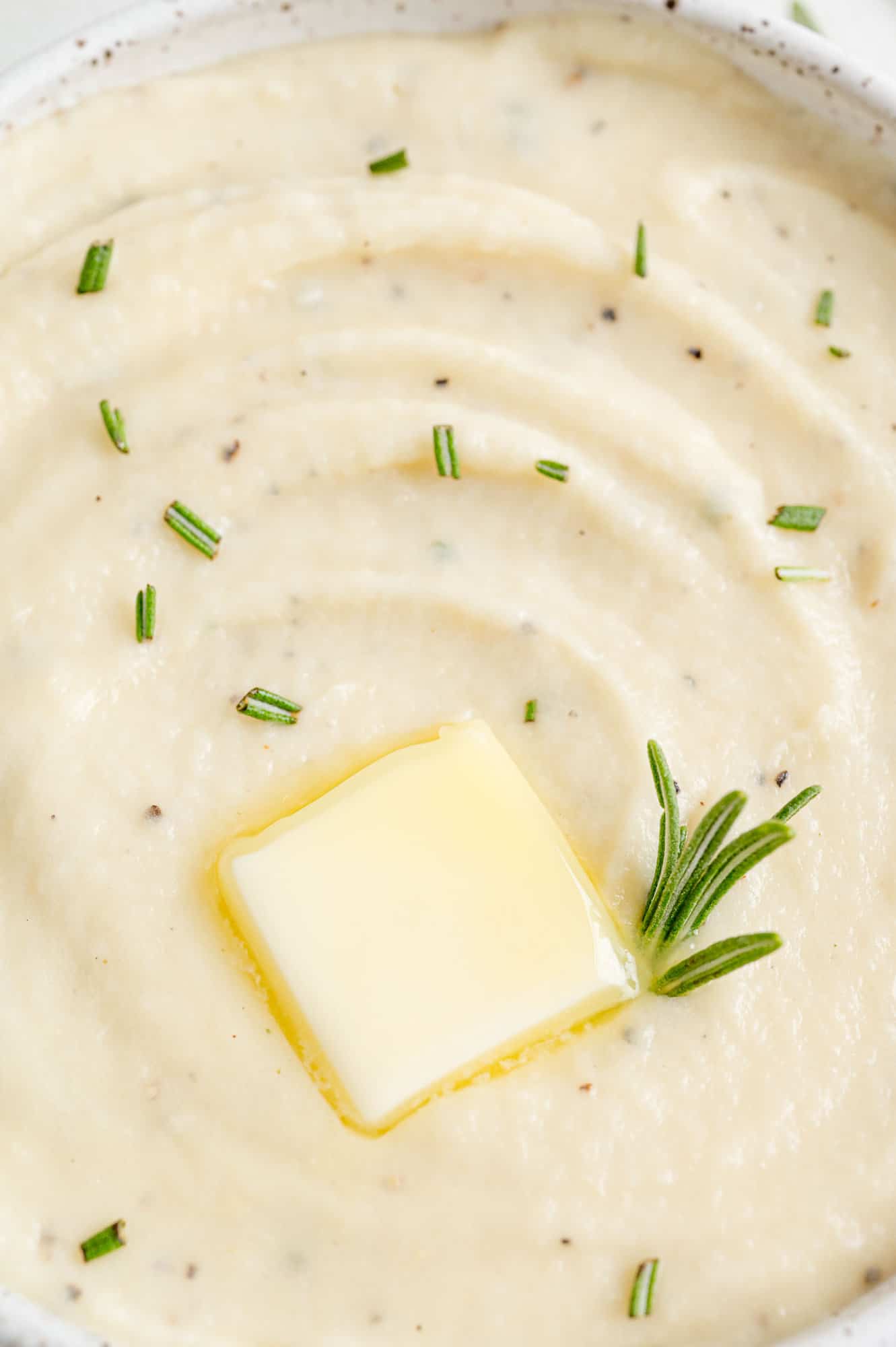 Close up view of butter on parsnip puree.