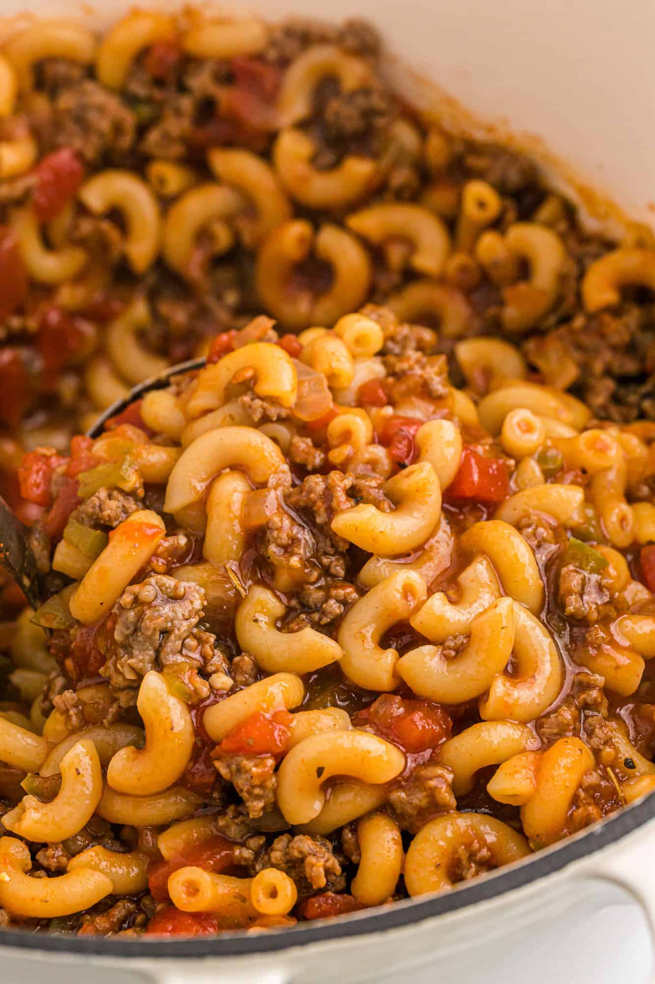 Goulash shown on a ladle.