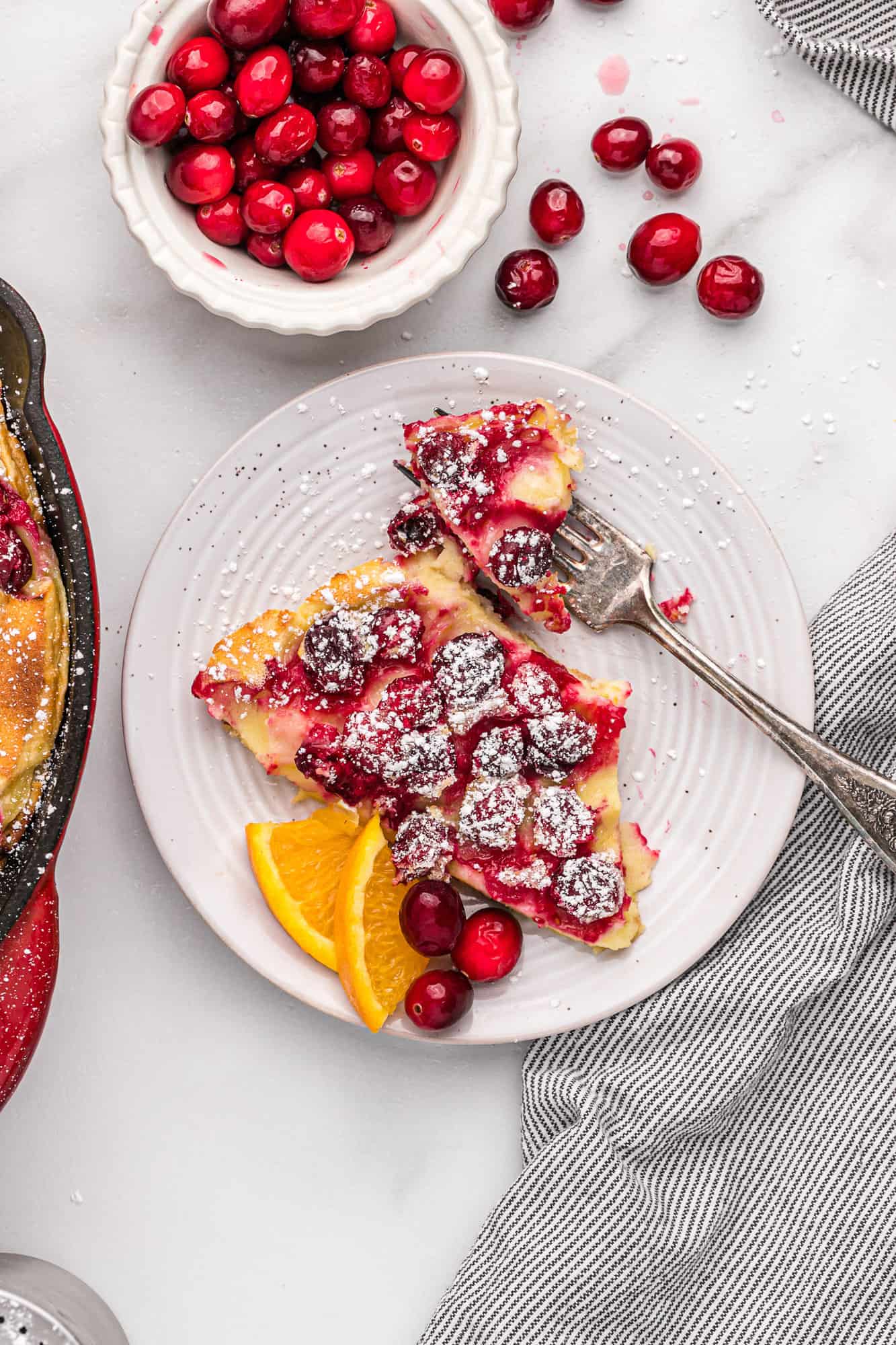 Slice of cranberry clafoutis.