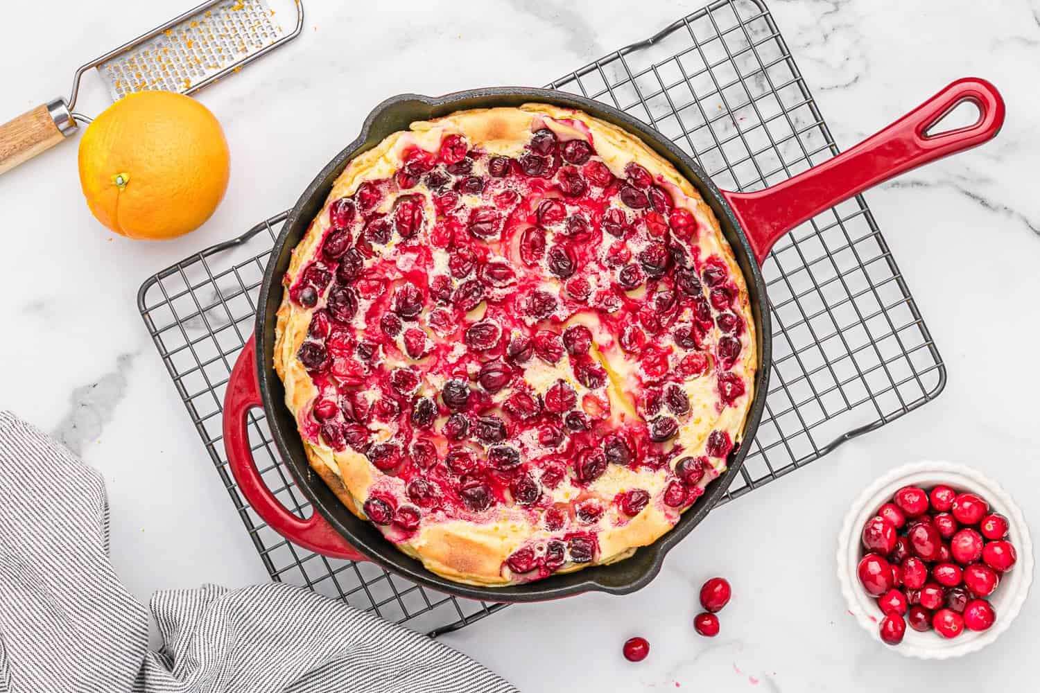 Baked clafoutis with cranberries.