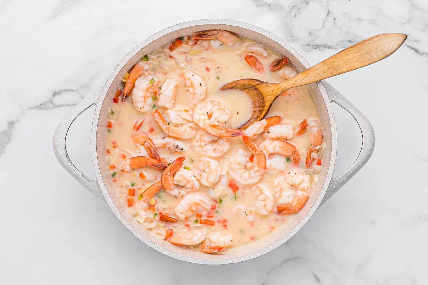 Shrimp added back to pan.