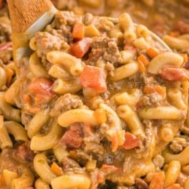 Homemade hamburger helper being scooped in a ladle.