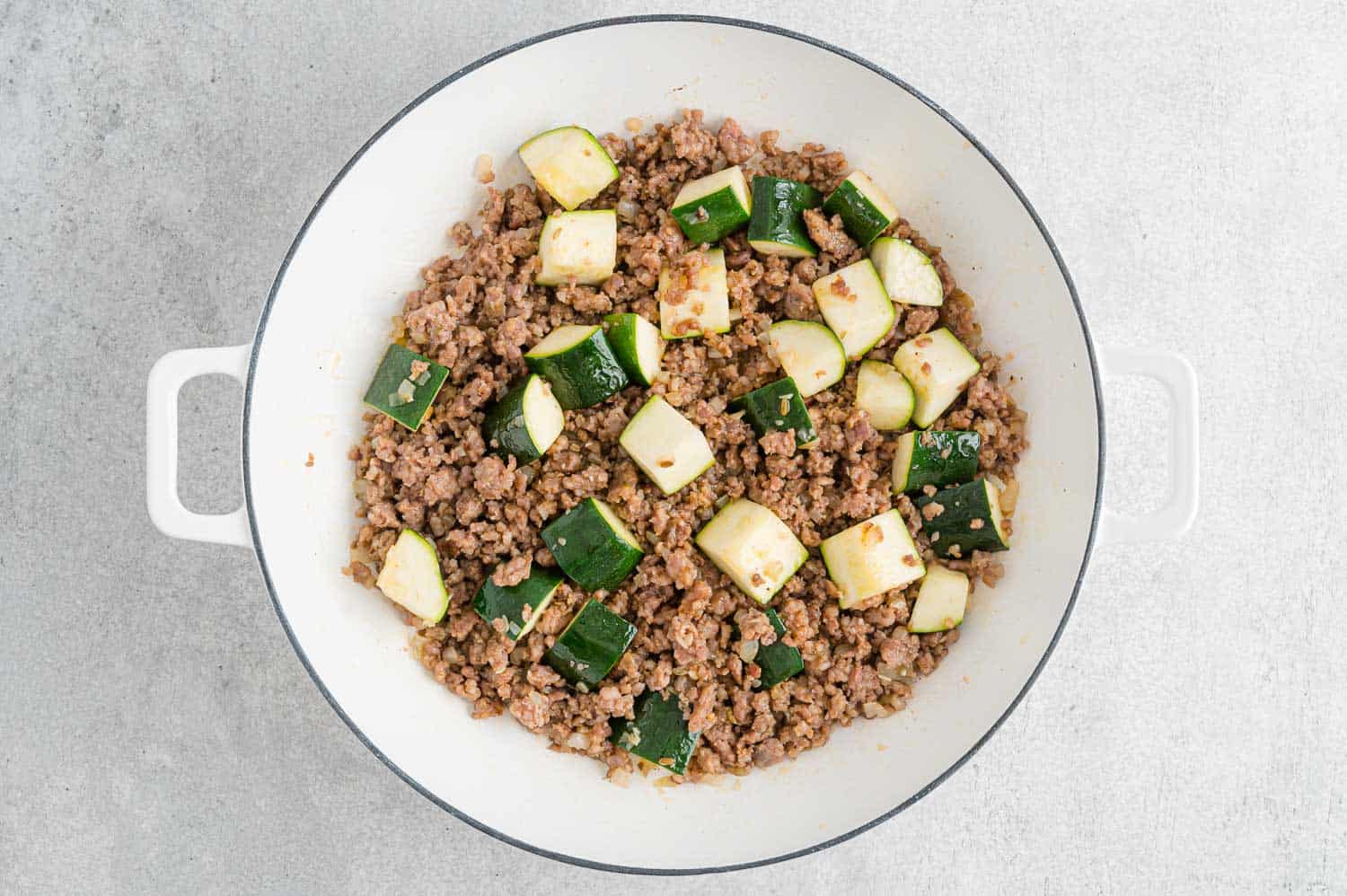 Zucchini added to pan.