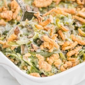 Homemade green bean casserole in a white dish.