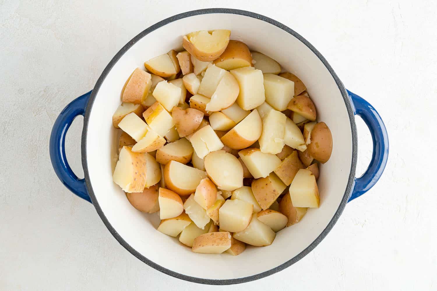 Cooked diced potatoes that have been drained.
