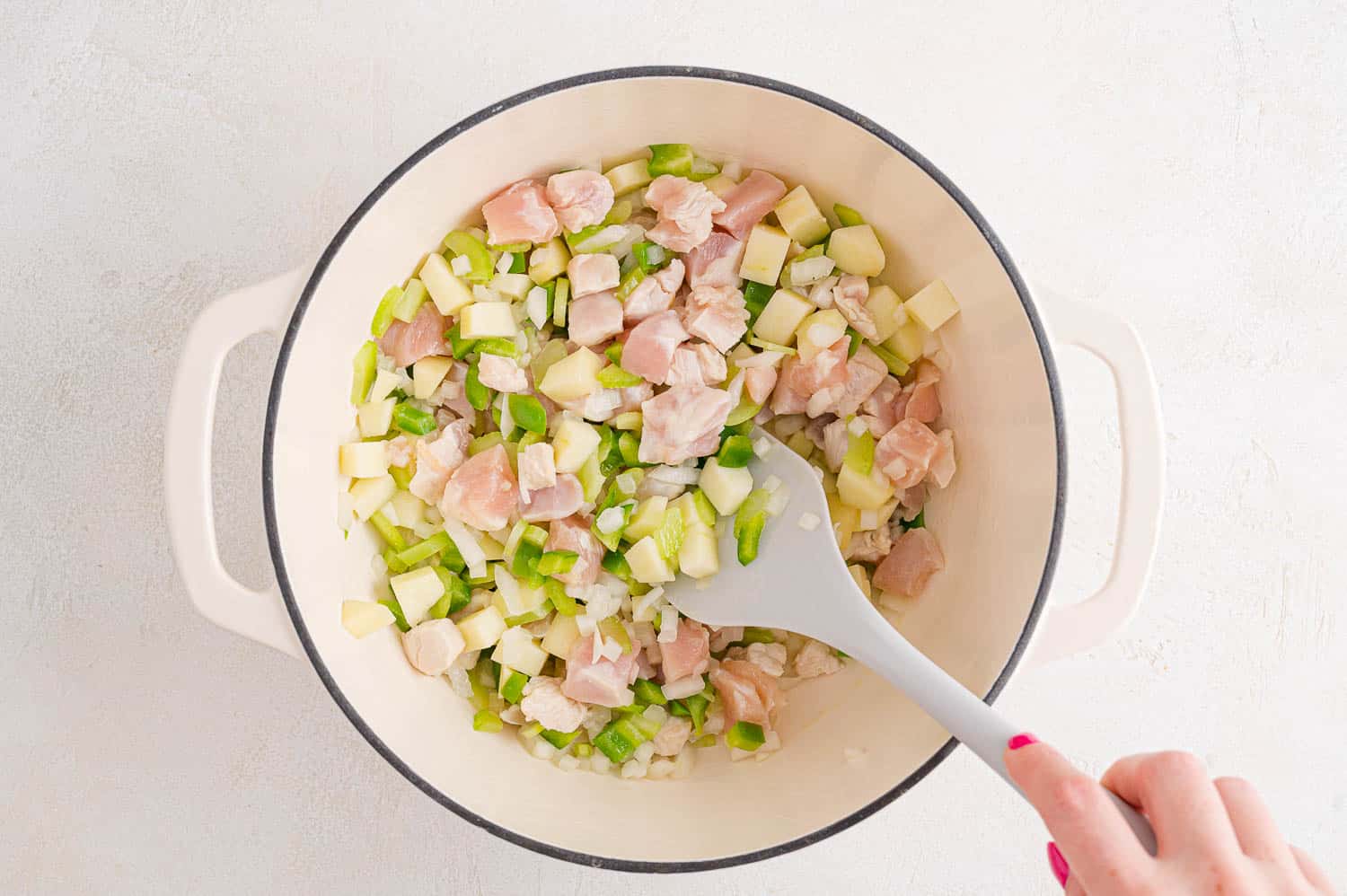 Vegetables and chicken cooking.