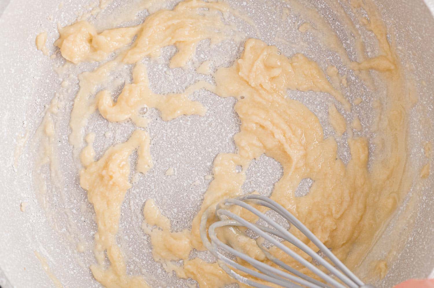 Butter and flour being whisked.