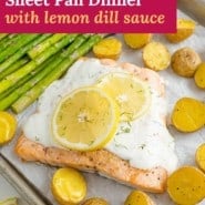 Salmon, text overlay reads "salmon & asparagus sheet pan dinner with lemon dill sauce."