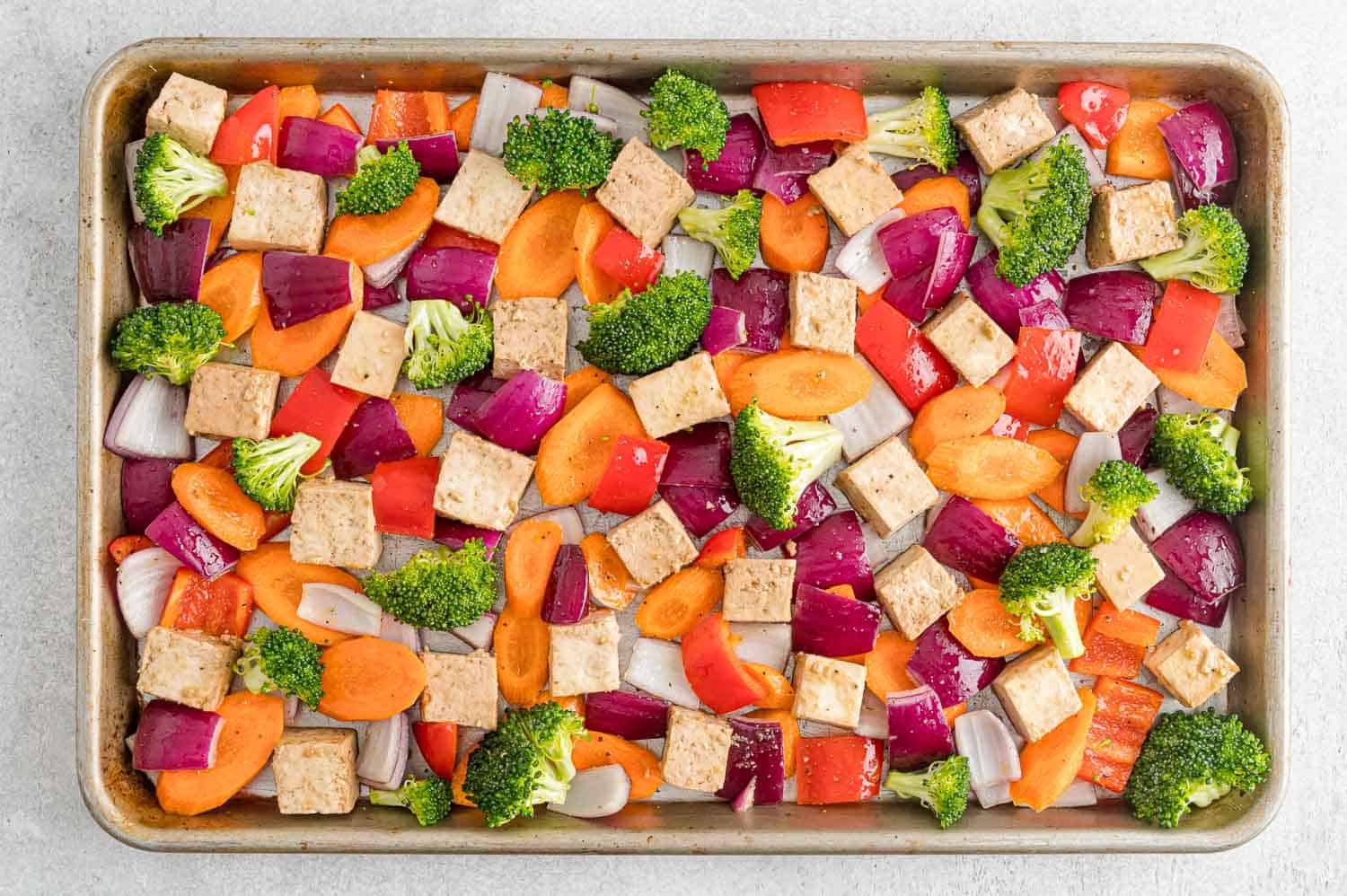 Uncooked tofu and vegetables.