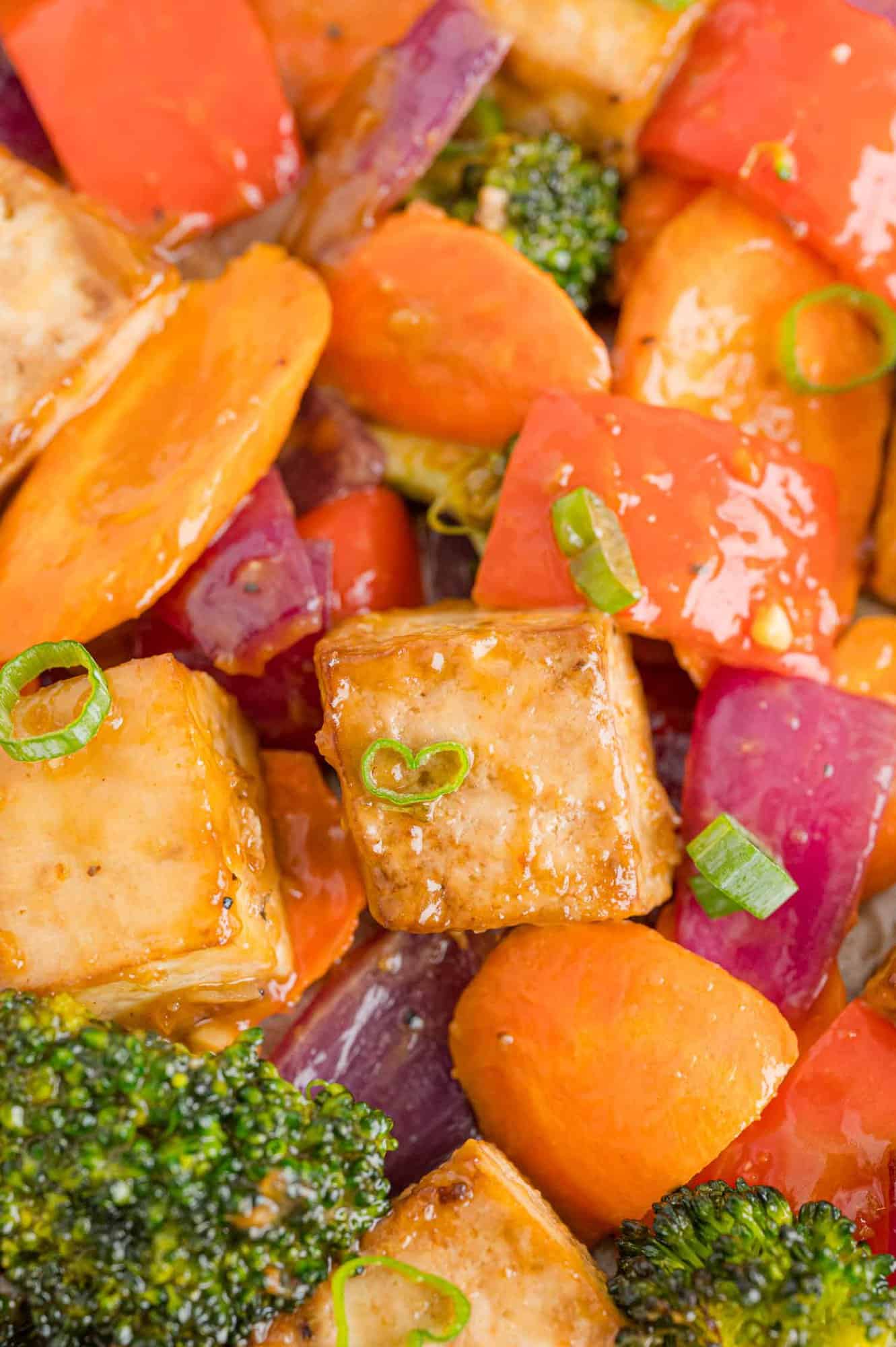Tofu and vegetables coated with peanut butter sauce.