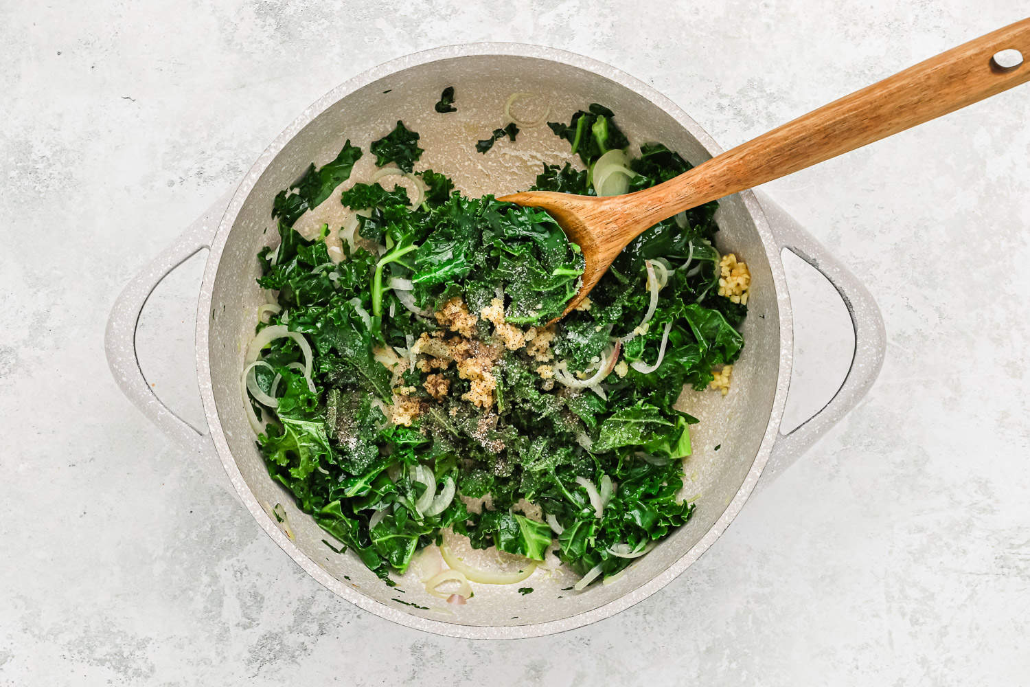 Kale being sautéed.