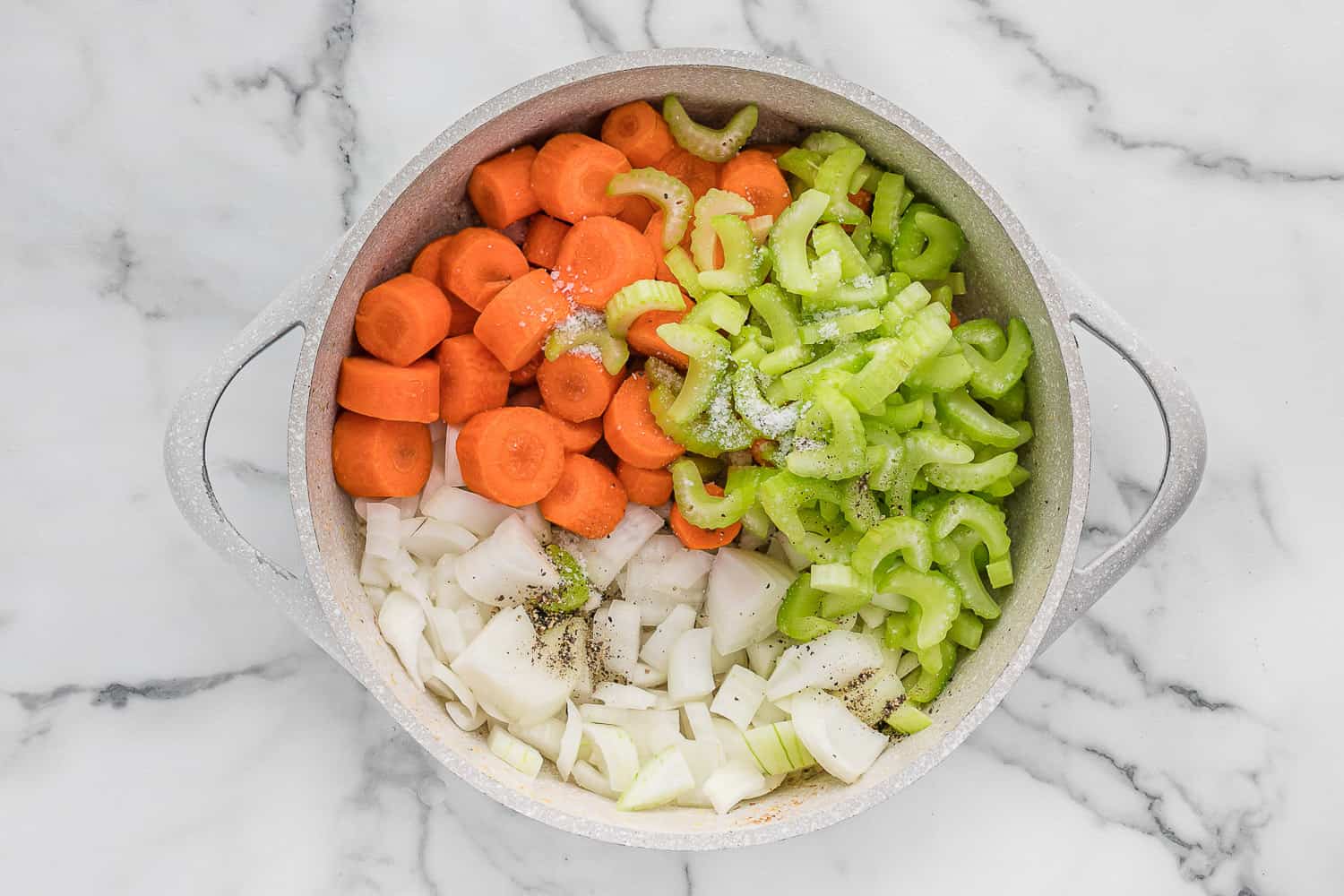 Vegetables added to pot.