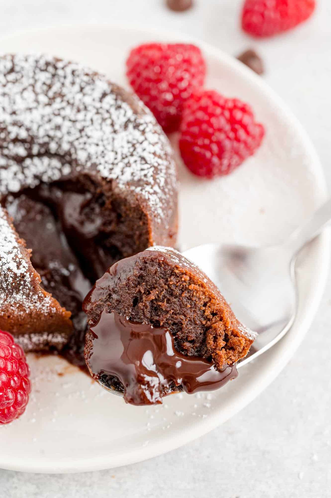 Cake and molten filling on a spoon.