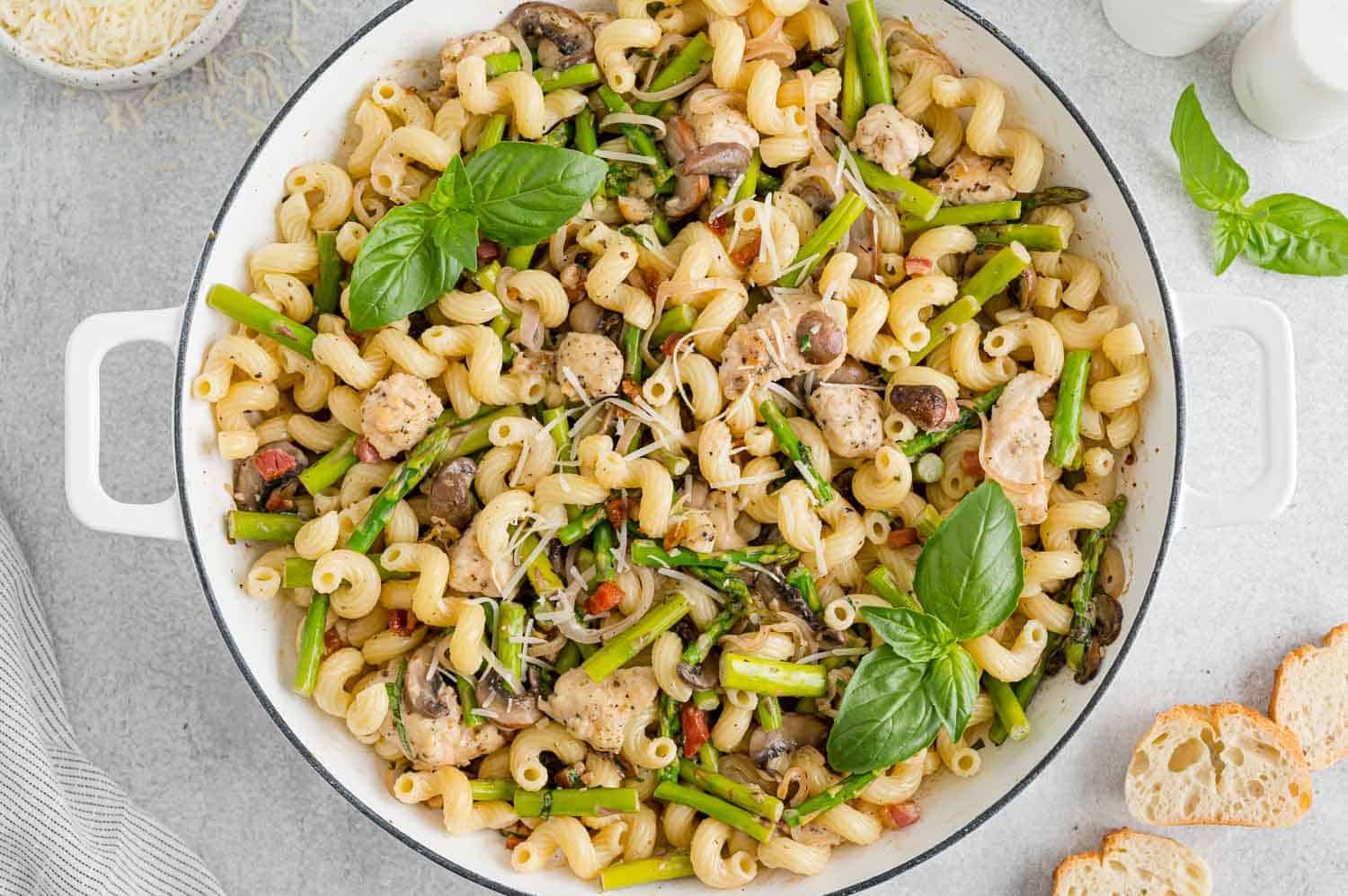 Pasta stirred back into pan.