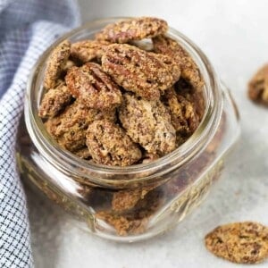 Bourbon candied pecans in jar.