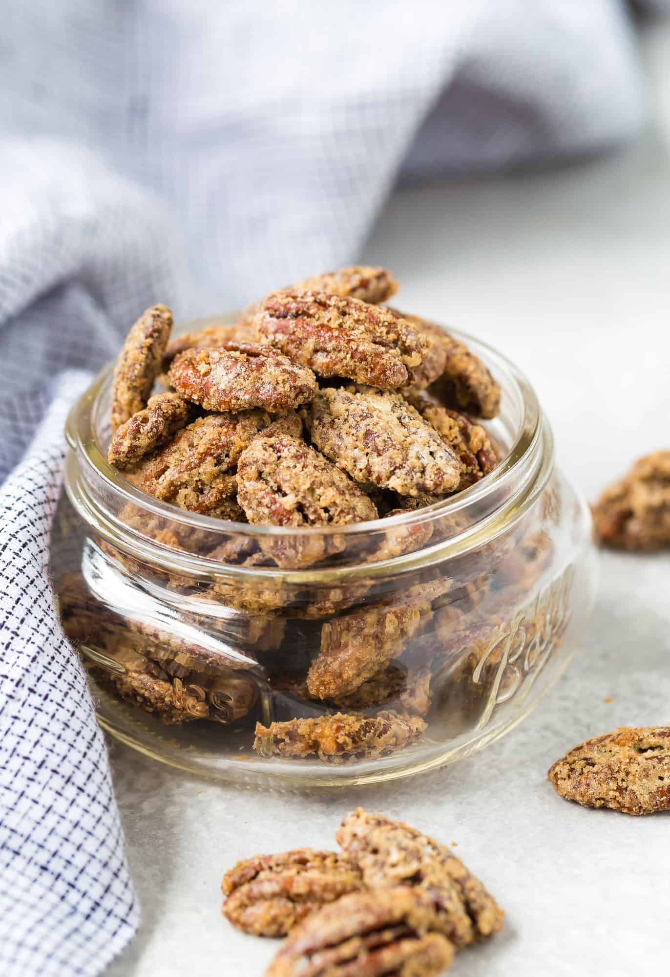 Sugared pecans in a jar.