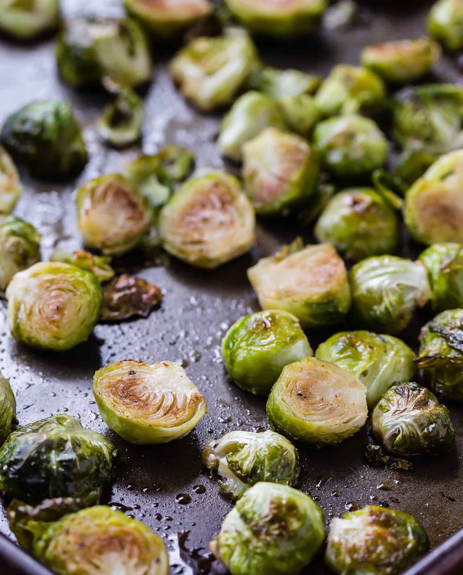 Cooked Brussels sprouts on sheet pan.