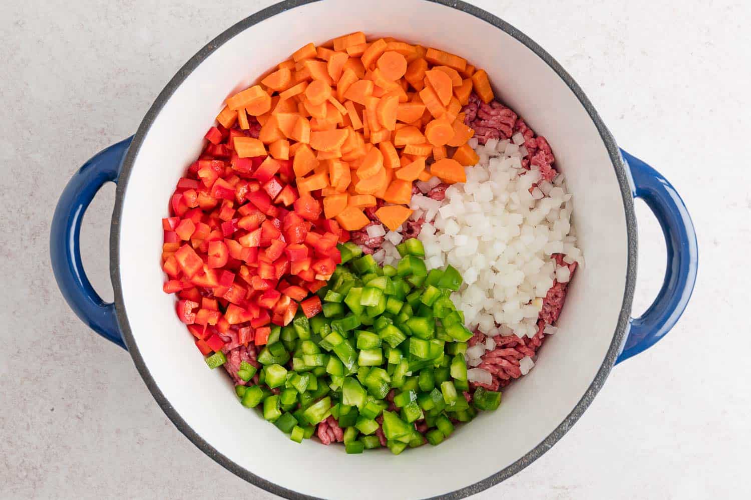 Vegetables added to pan.