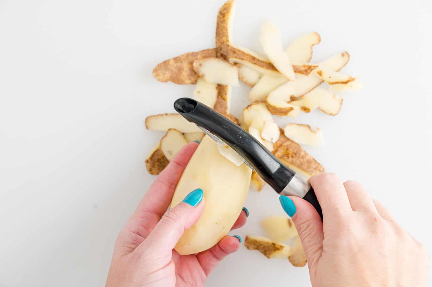 Mashed potato being peeled.