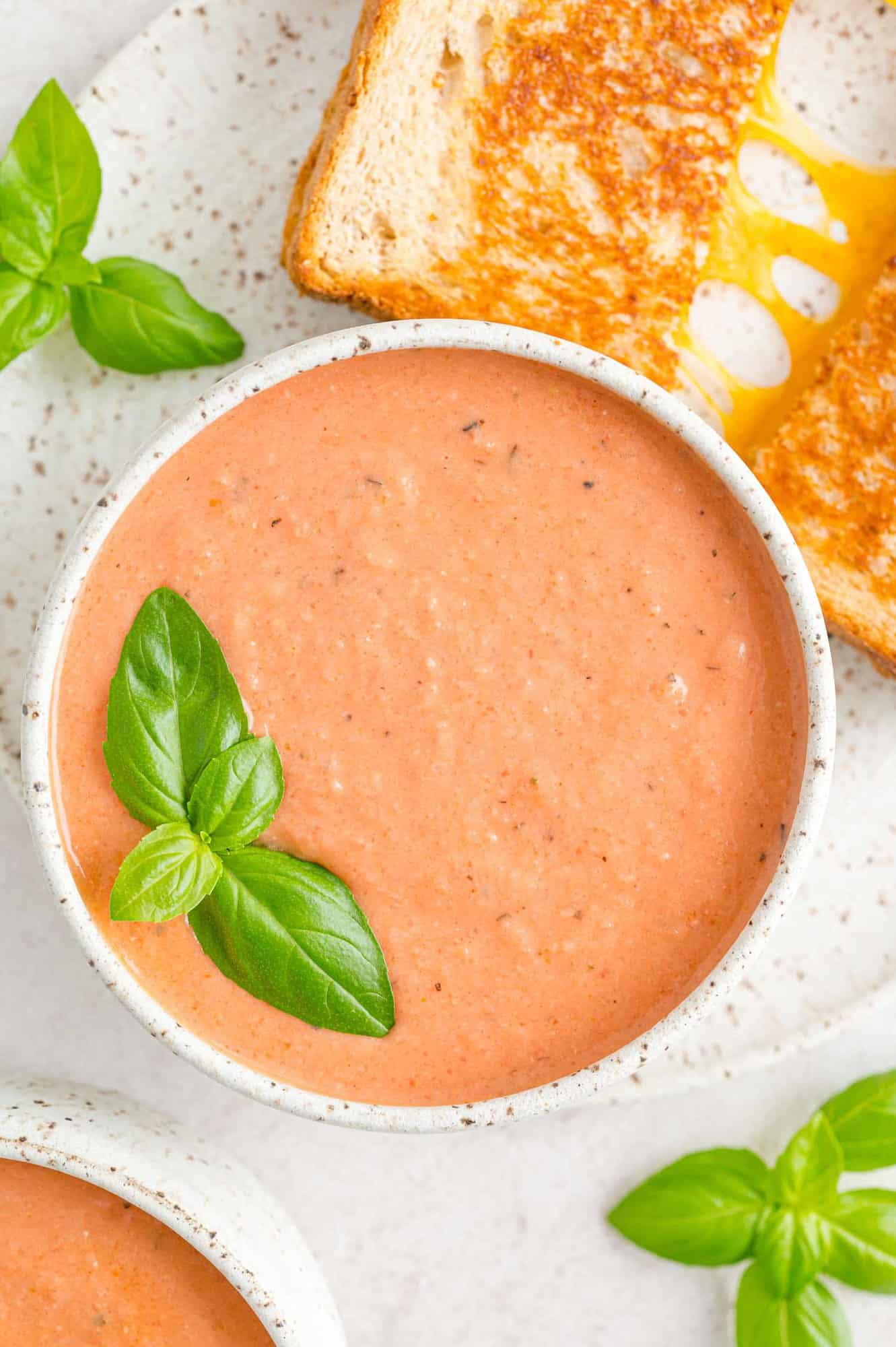 Tomato soup topped with basil.