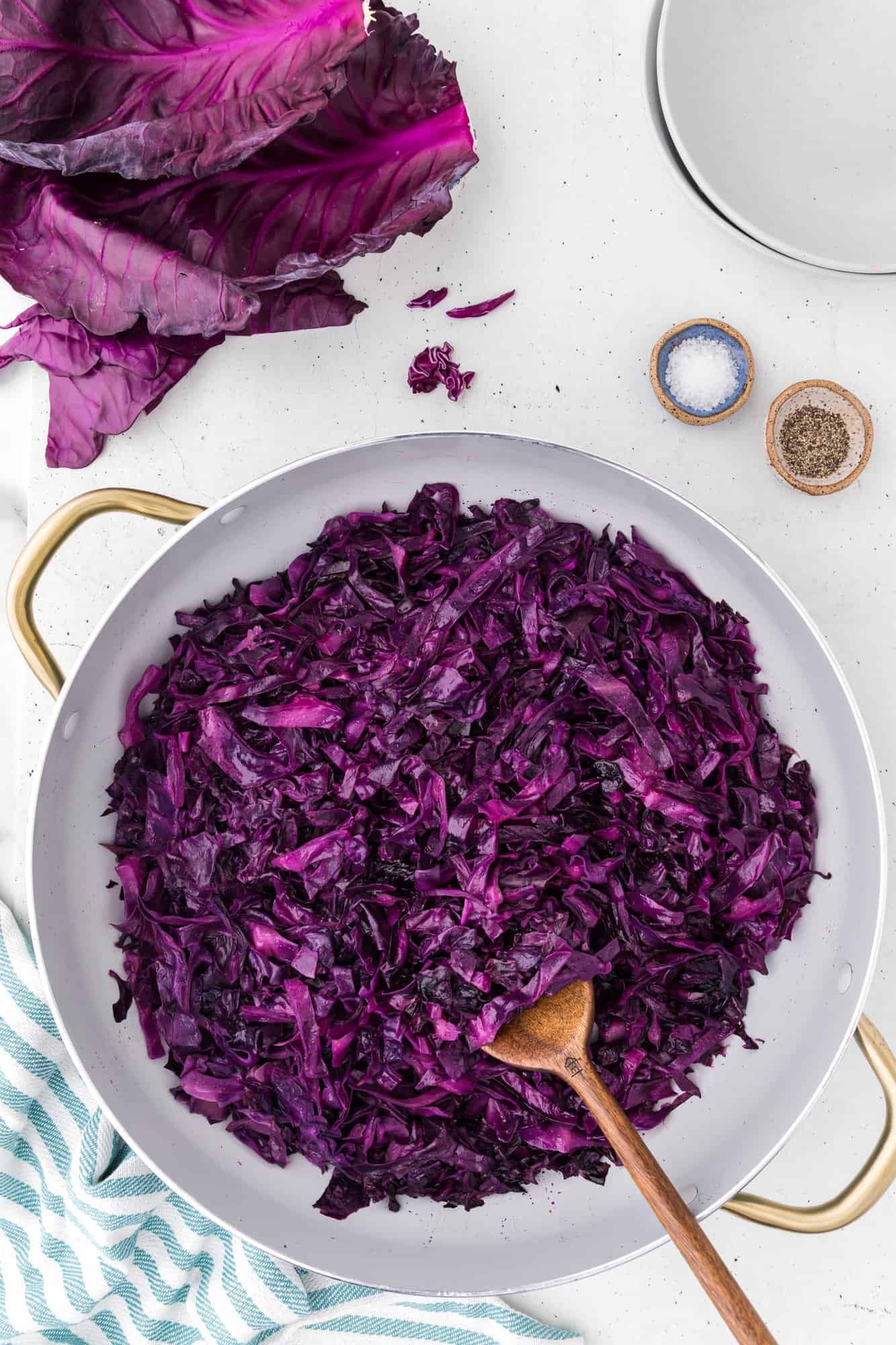 Sauteed red cabbage in a skillet.