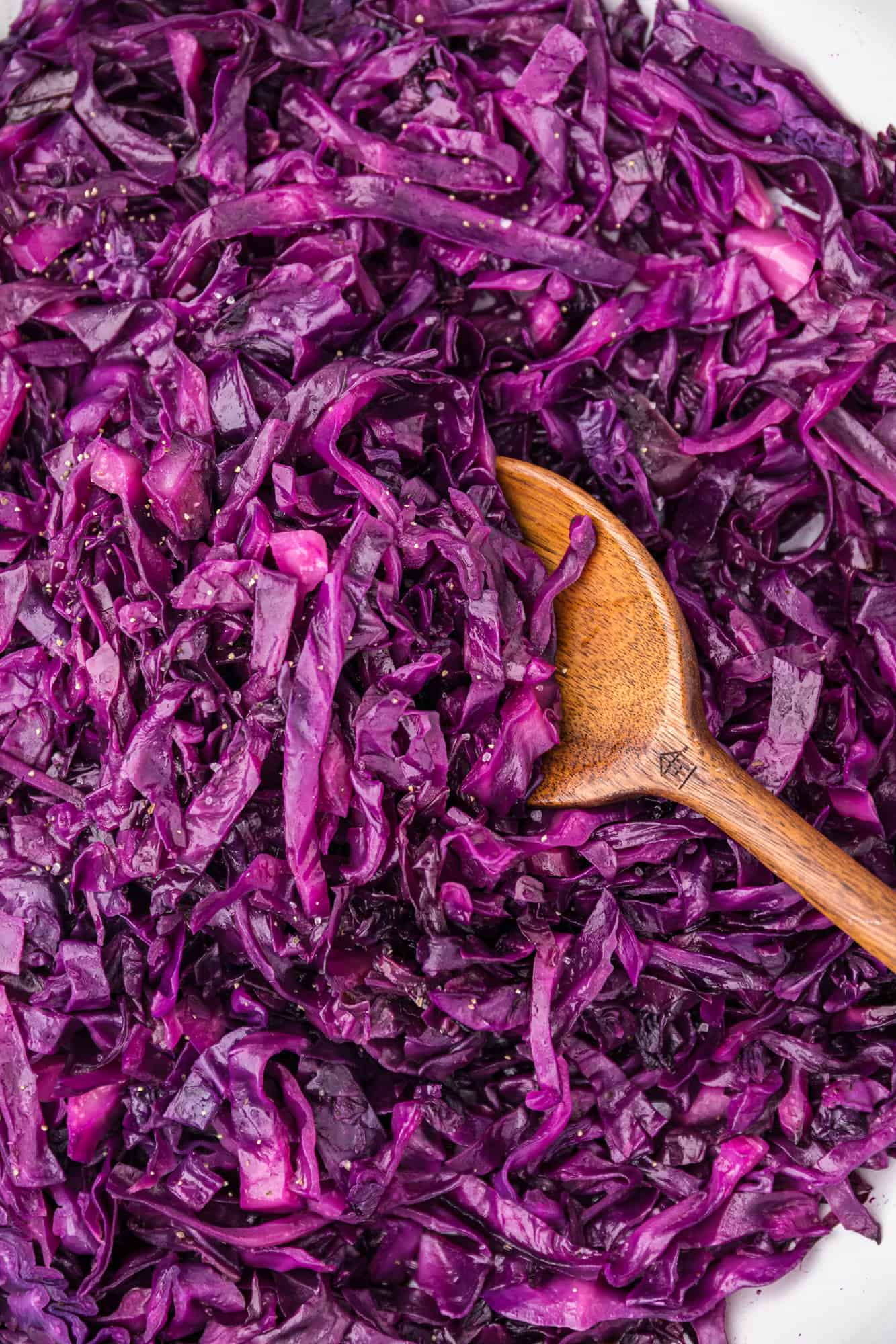 Close up of german cabbage with a wooden spoon.