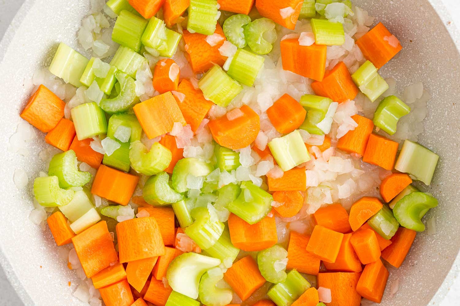 Vegetables being sauteed.