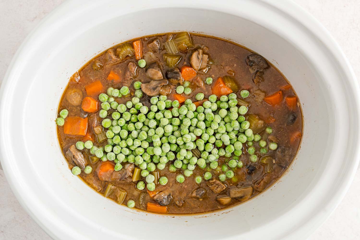 Peas added to crockpot