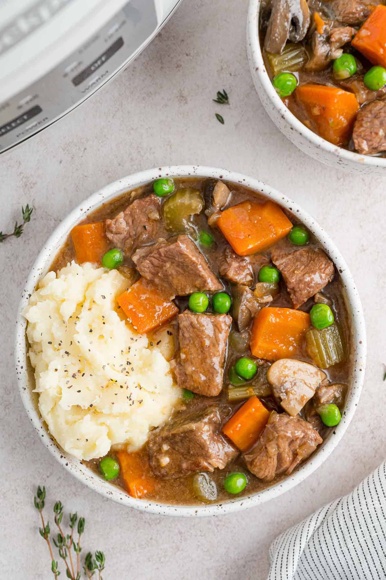 Beef stew with mashed potatoes.