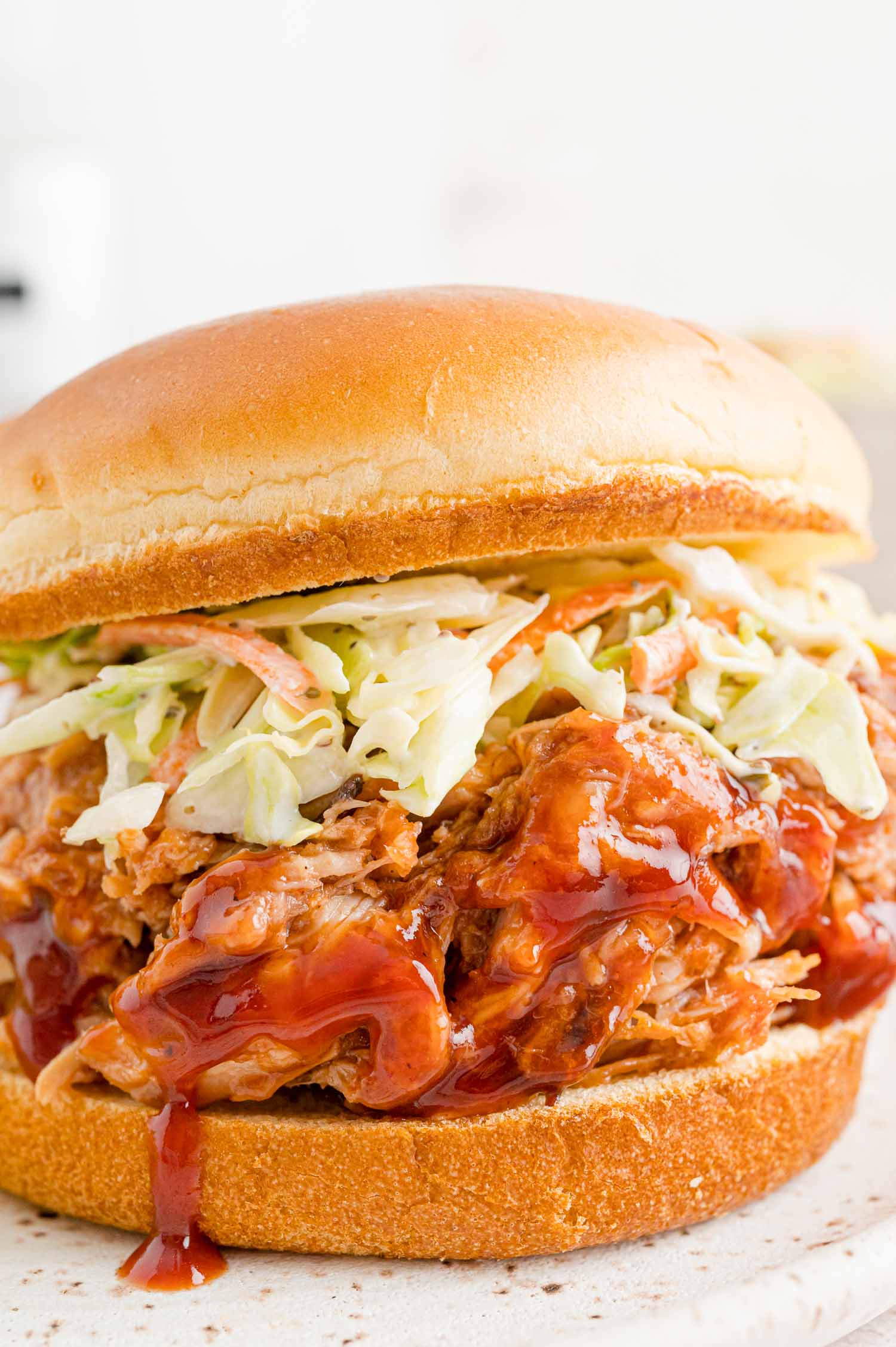 https://www.rachelcooks.com/wp-content/uploads/2022/12/Slow-Cooker-Pulled-Pork-with-Cherry-BBQ-Sauce019-web.jpg