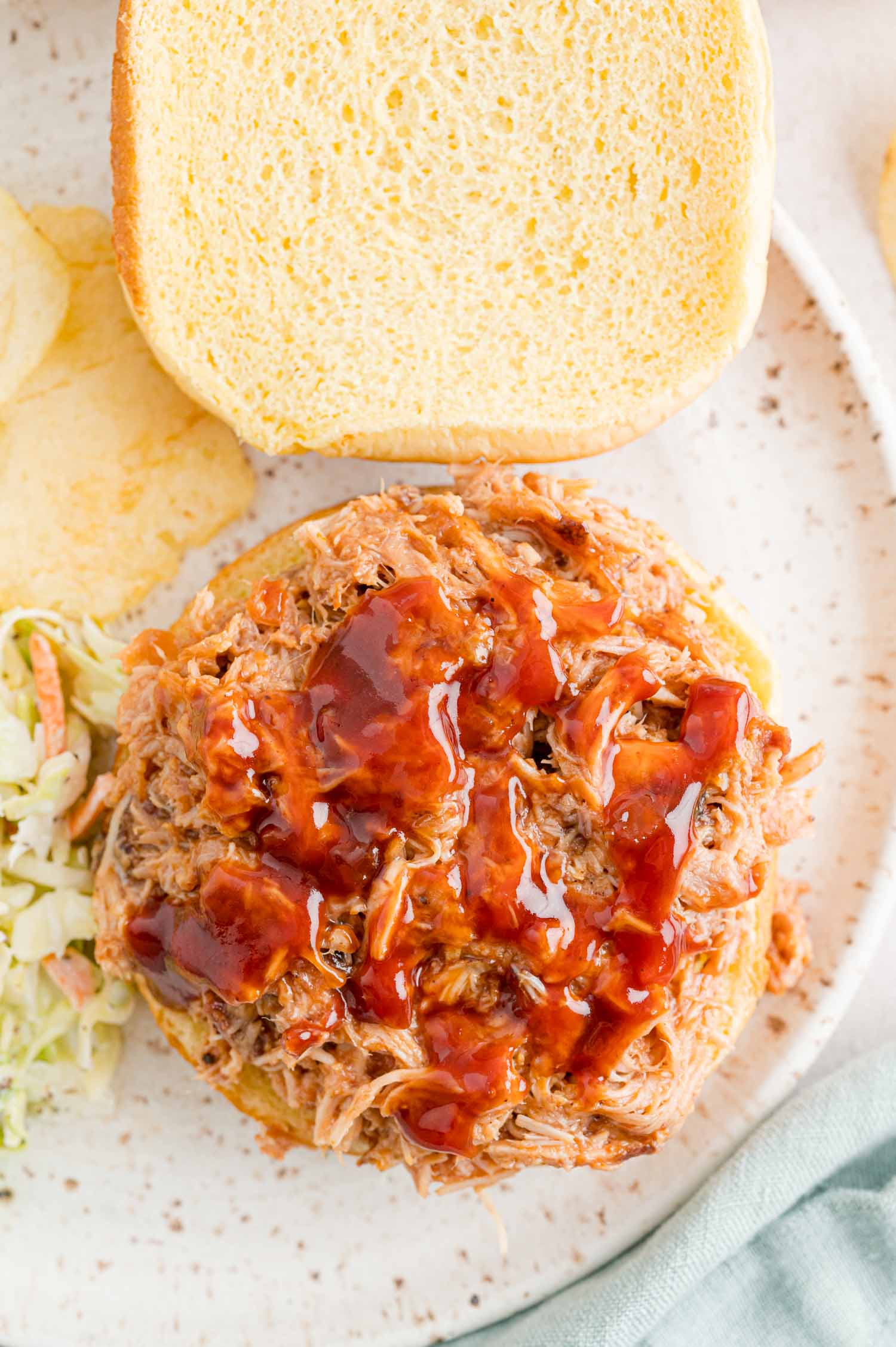 Open faced sandwich with bbq sauce.