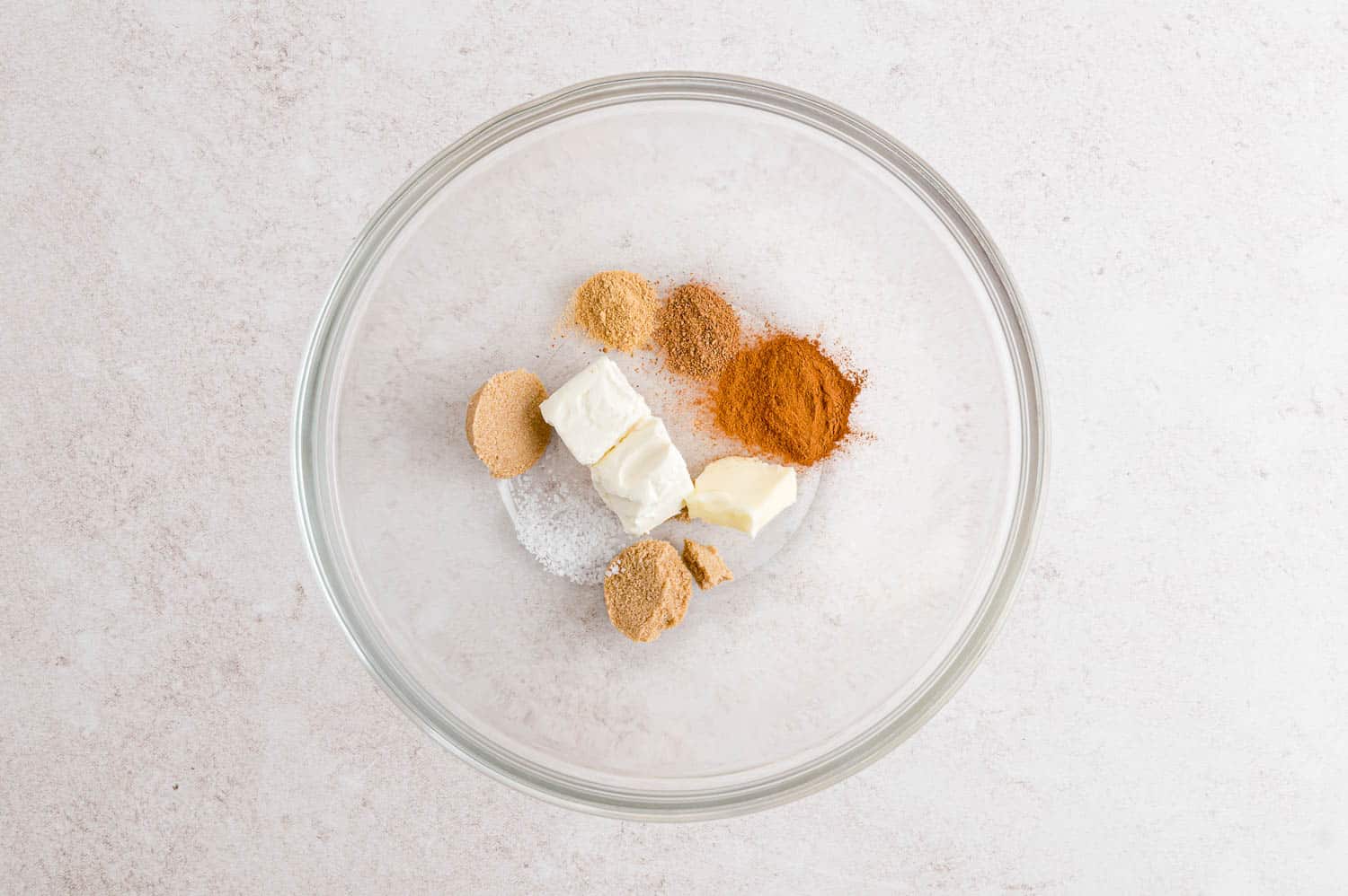 Some of filling ingredients in glass mixing bowl.