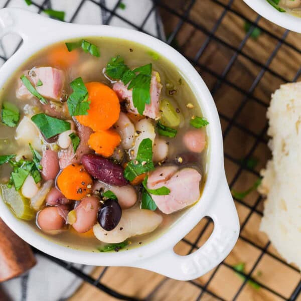 Overhead view of 15 bean soup garnished with parsley.