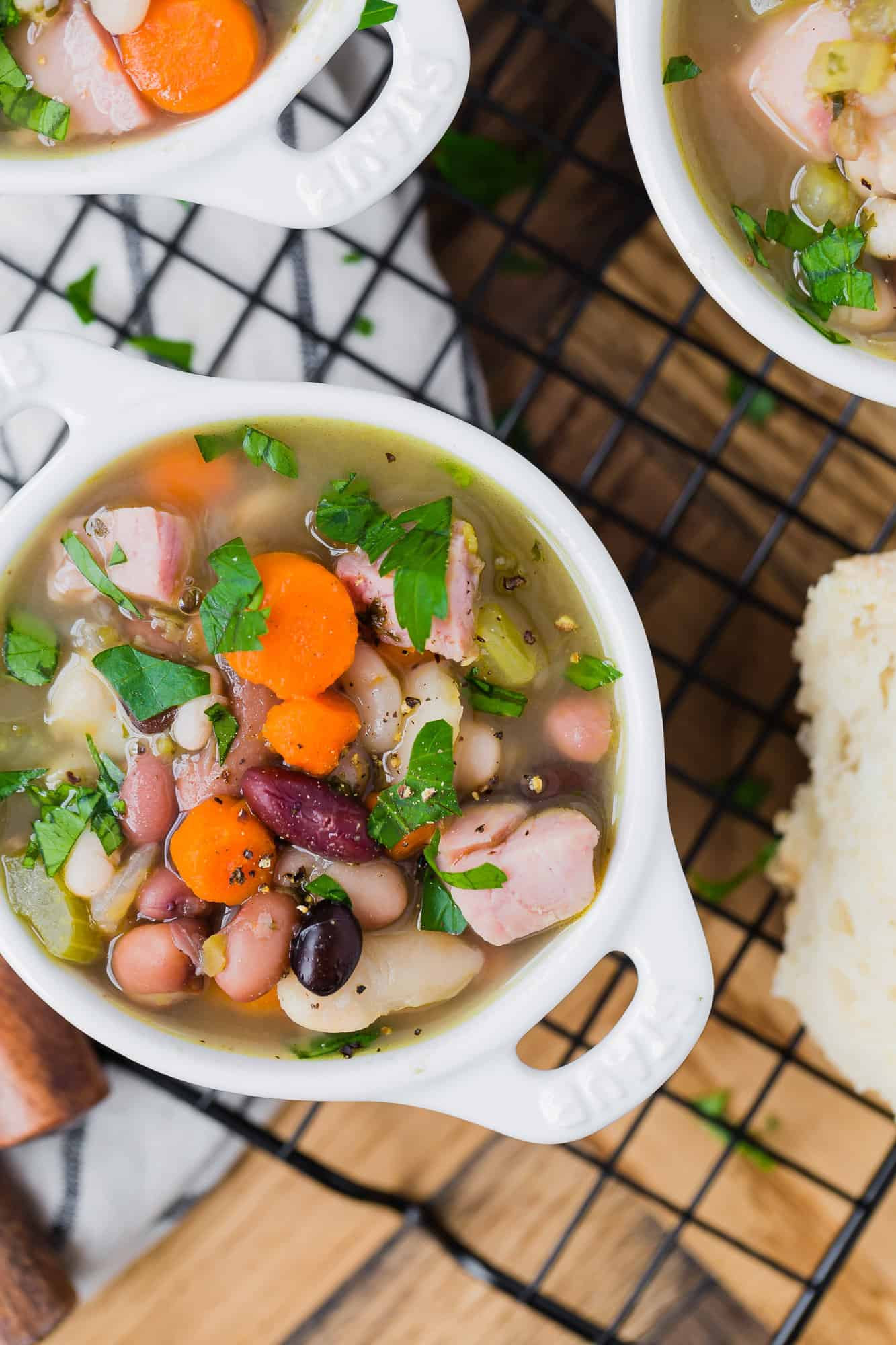 15 bean soup in a white bowl, other bowls partially visible.