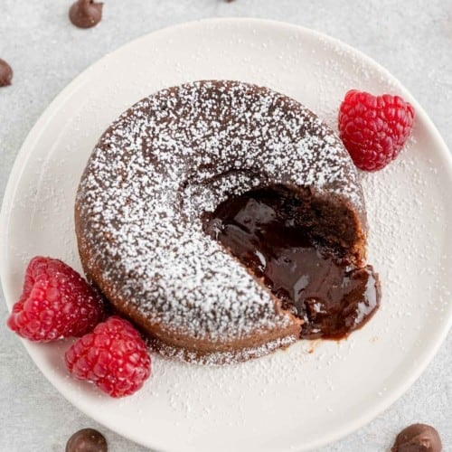 Chocolate lava cake with a bite out of it.