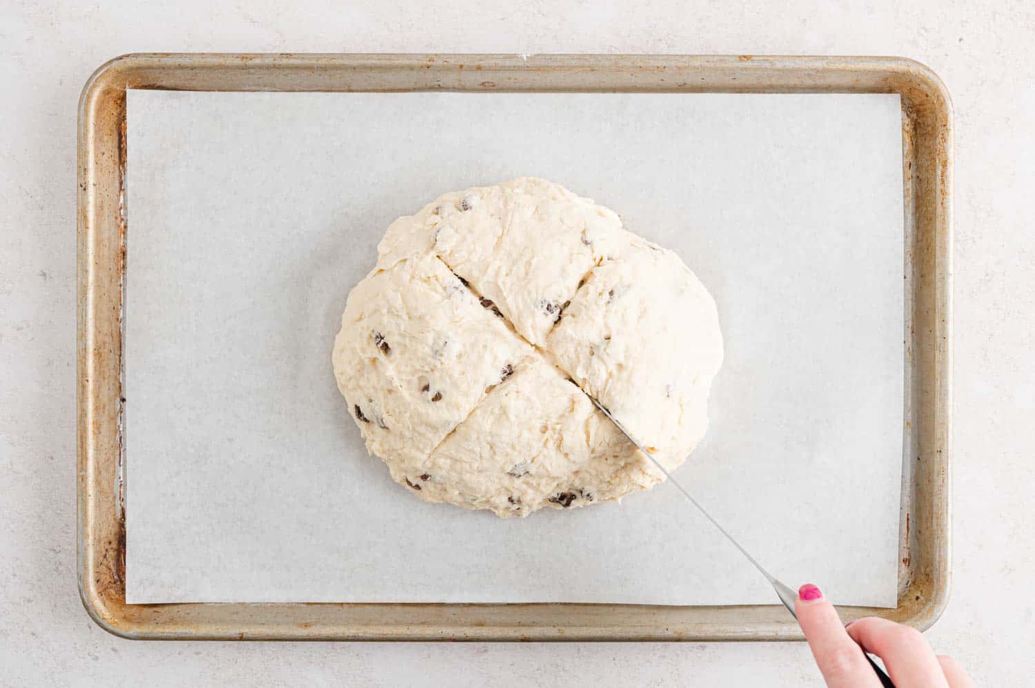 Dough being scored.