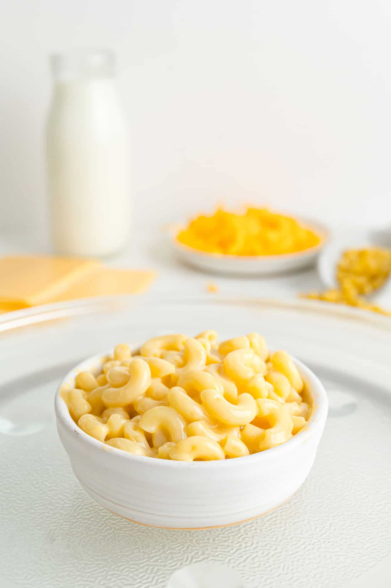 Mac in cheese in a small white bowl.