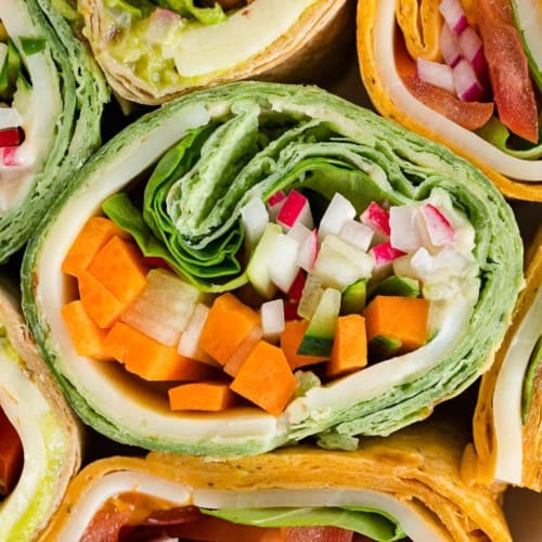 Cross section of several vegetarian wraps.