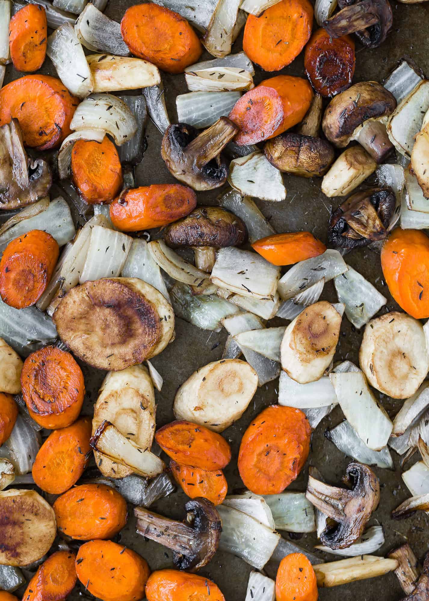 Roasted vegetables on a sheet pan.