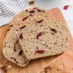 Three slices of cranberry walnut bread.