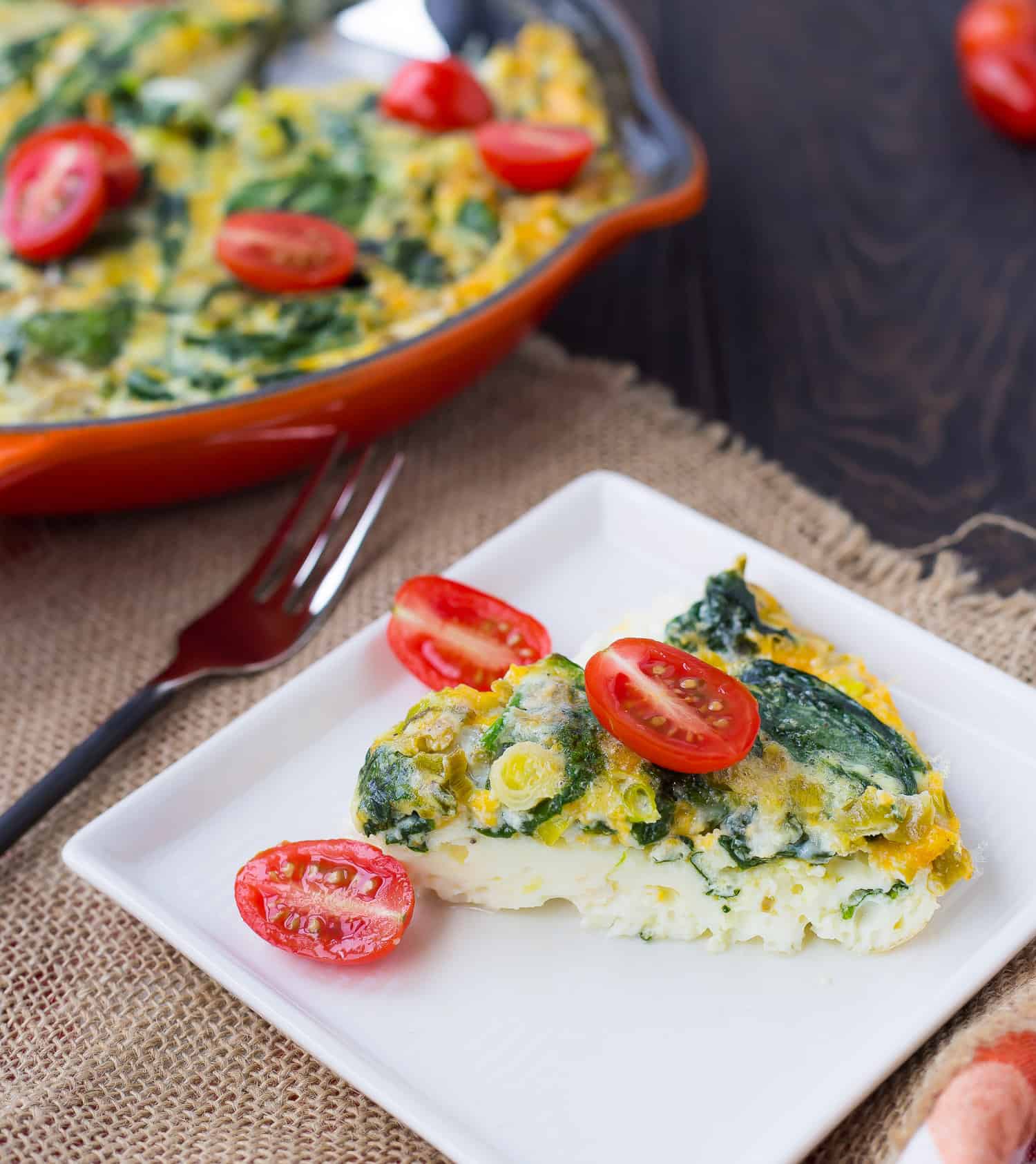 Slice of egg white frittata on white plate.