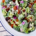 Healthy broccoli salad with bacon and red onion.