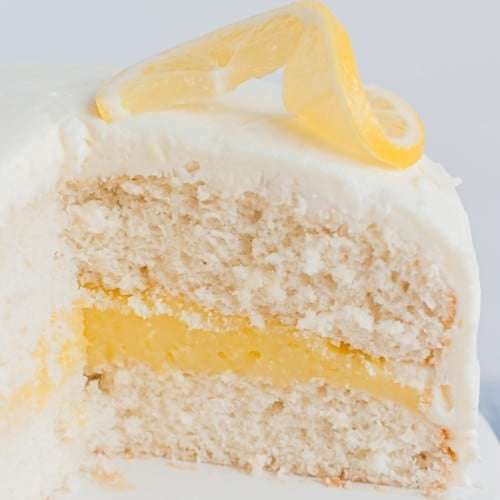 Lemon cake cut to show filling.