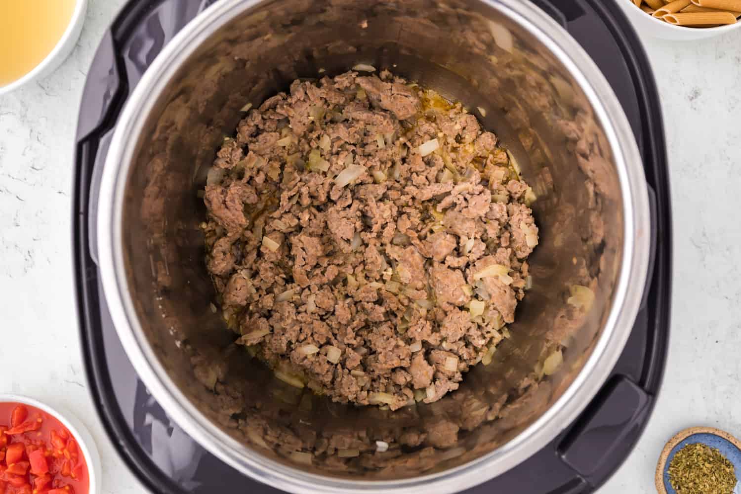 Browned sausage and onions in instant pot.