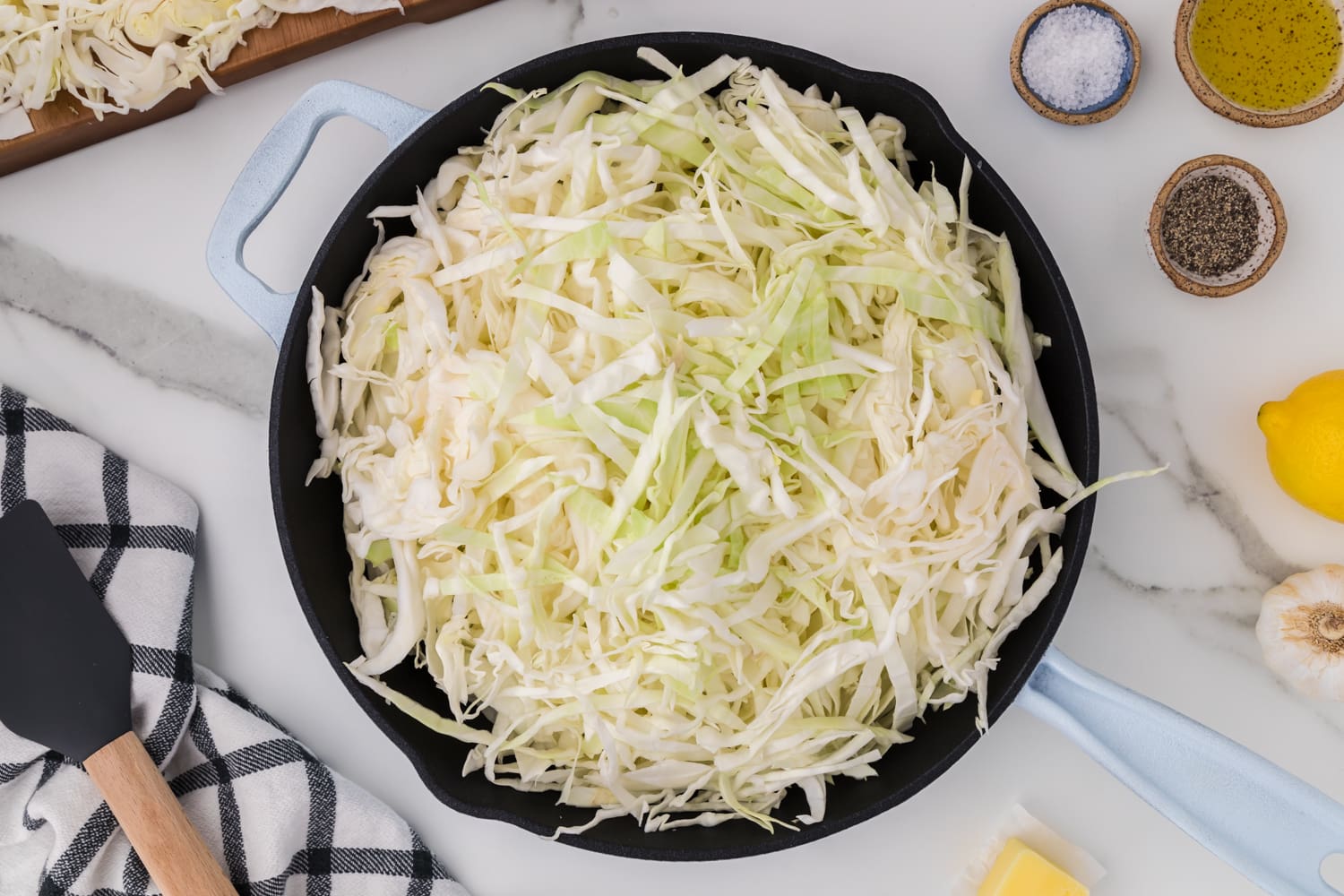 Uncooked cabbage in pan.