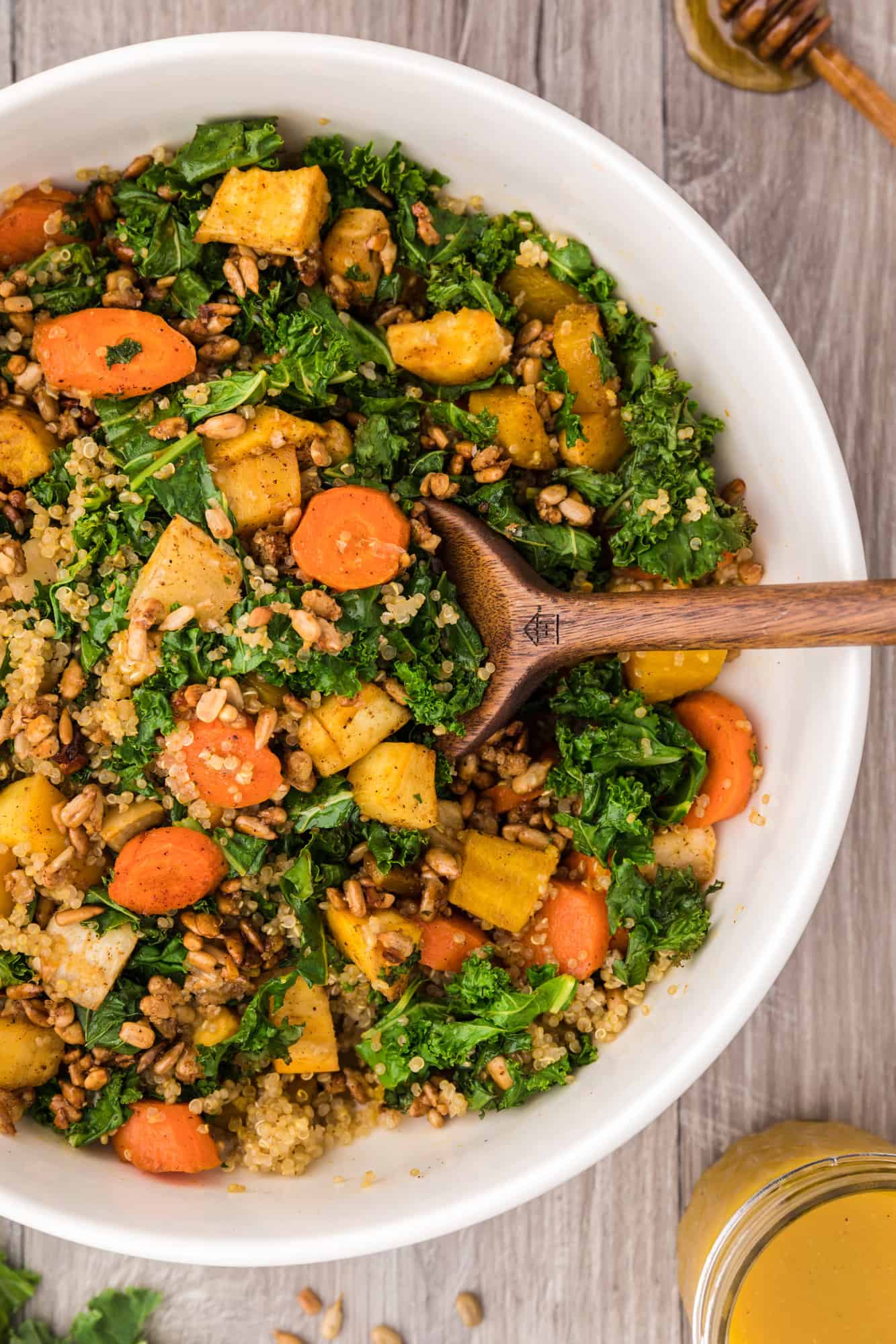 Warm kale salad with quinoa and roasted vegetables.