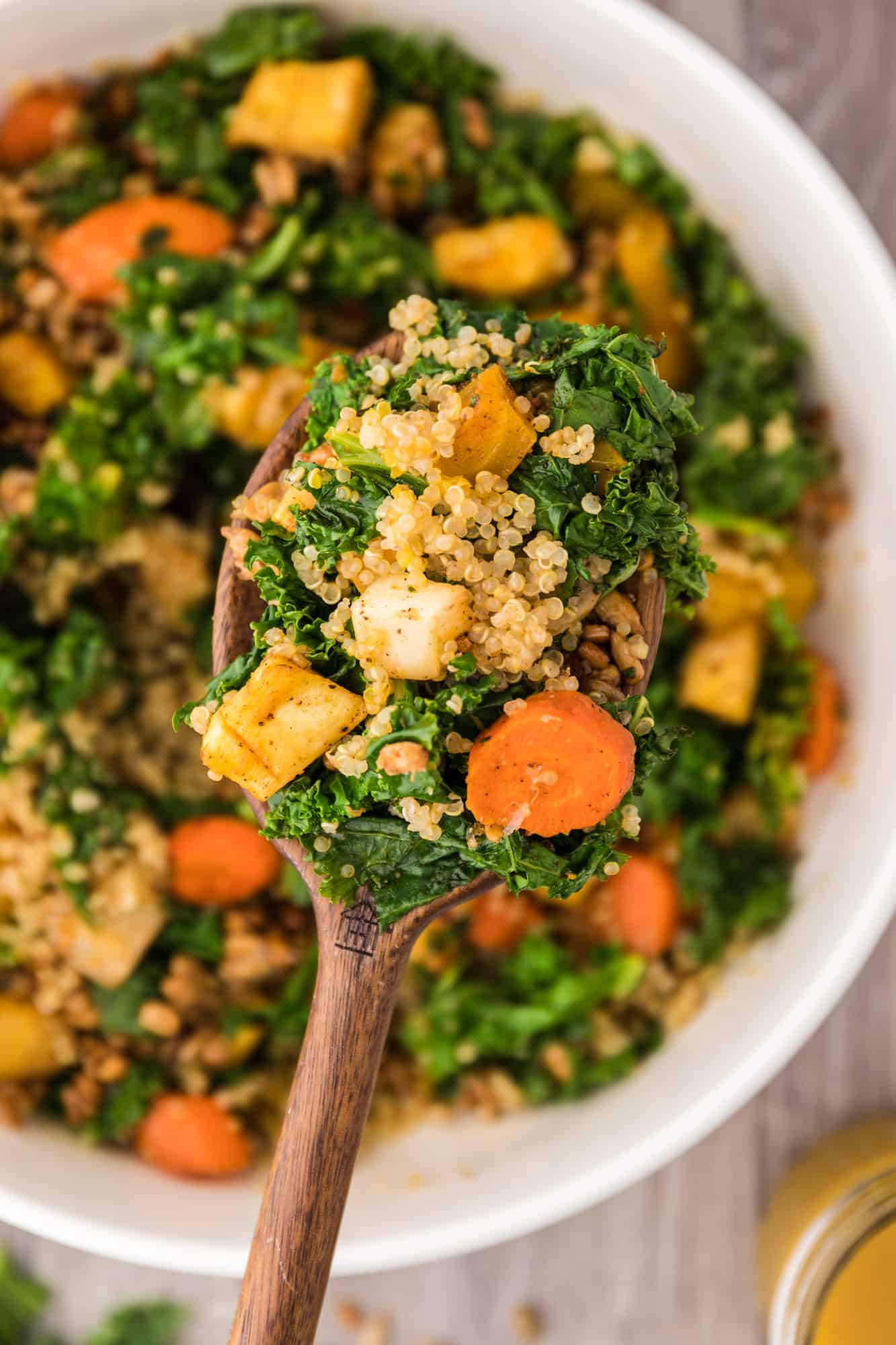 Kale salad on a spoon.